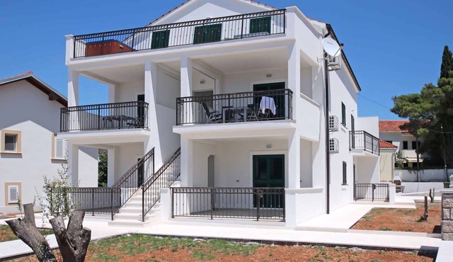 Holiday apartment with air conditioning and balcony