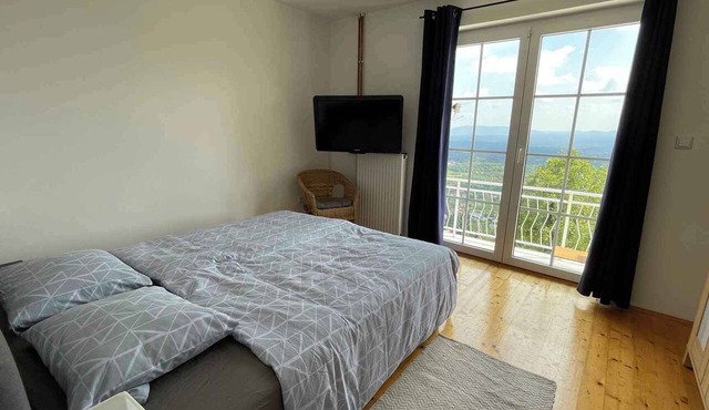 Holiday home with a beautiful view in Semič