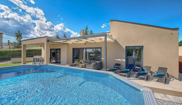 Holiday home with pool and beautiful garden in Rebići
