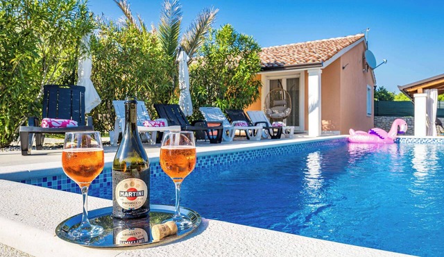 Holiday House Nives with pool and playground