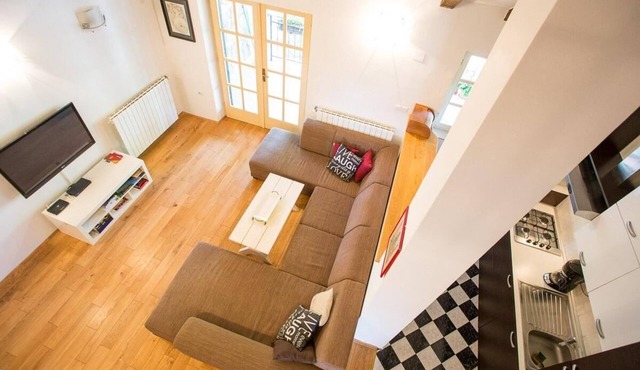 House with a modern interior and an old taverna