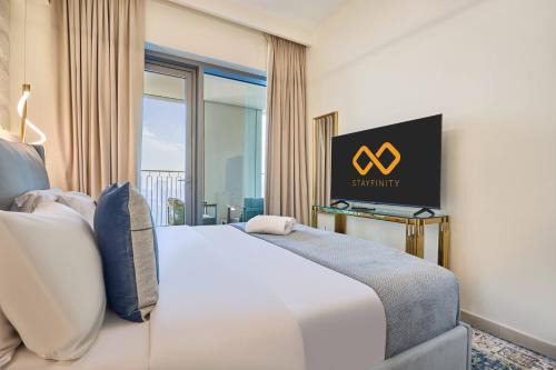 Luxury 4 Bedroom High-Floor Apartment, Spectacular Burj Khalifa & Fountain Views, Steps Away from Dubai Mall - Downtown Dubai by Stayfinity in Dubai