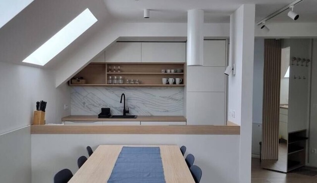 Modern and renovated attic apartment. in Bled