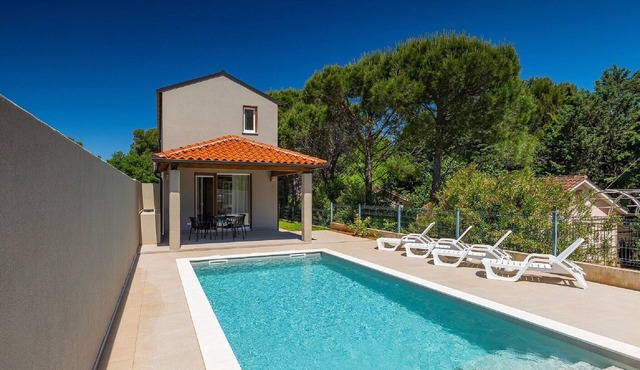 Modern home with swimming pool near the beach