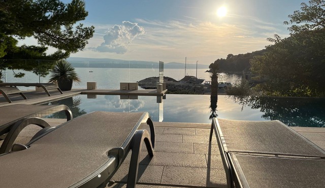 One bedroom apartment with a swimming pool by the beach Medići, Omiš (A-25214-f)