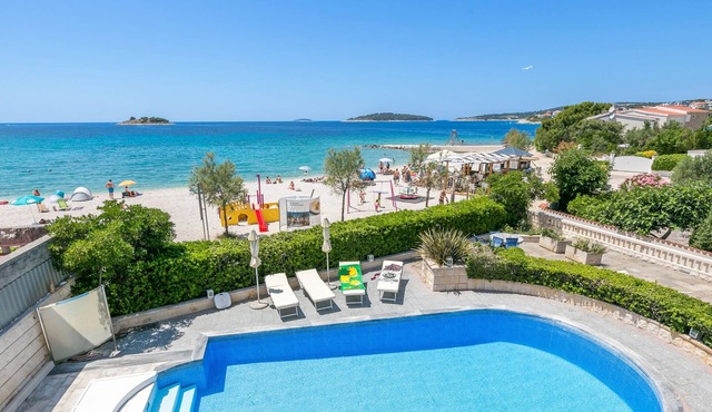 Studio flat with a swimming pool by the beach Rogoznica (AS-7557-a) in Rogoznica