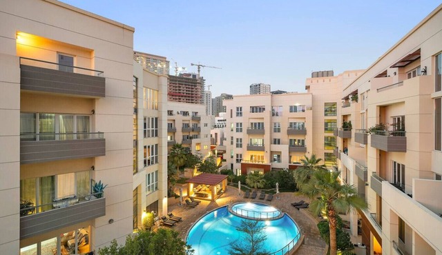 Stylish Dubai Apartment with Balcony, Gym, Pool, and Fast WiFi in JVC