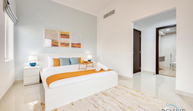 Sunny 1BR at Canal Residences West Dubai Sports City by Deluxe Holiday Homes in Dubai