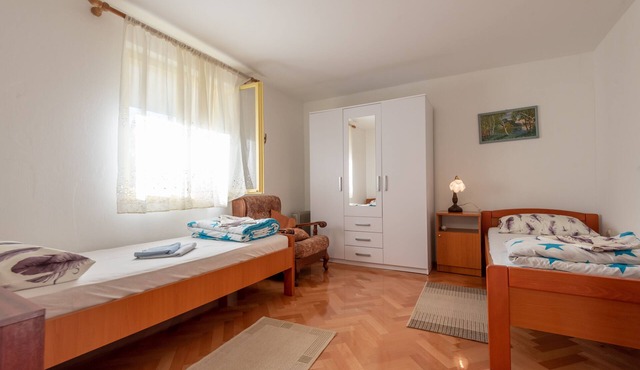 The apartment consists of two bedrooms, a bathroom, a kitchen and a living room in Zadar