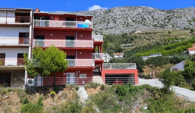 Three bedroom apartment with balcony and sea view Stanići, Omiš (A-10324-c) in Omis