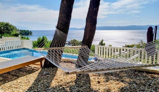 Two bedroom apartment with a swimming pool Lokva Rogoznica, Omiš (A-25508-a)