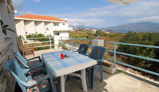 Two bedroom apartment with terrace and sea view Lumbarda, Korčula (A-4376-a)