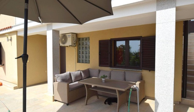 Two bedroom apartment with a swimming pool Omišalj, Krk (A-20617-a)