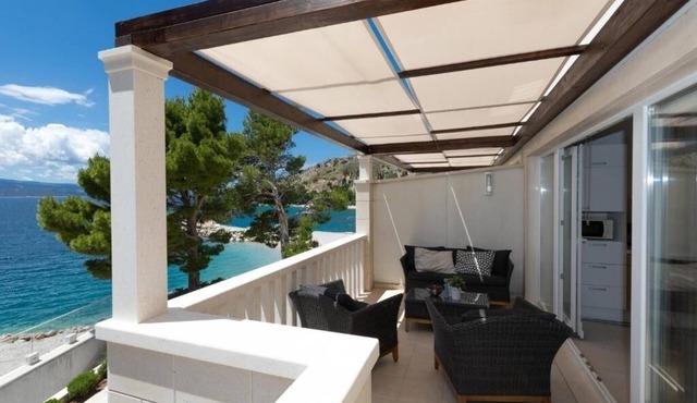 Two bedroom apartment with a swimming pool by the beach Medići, Omiš (A-25214-b)