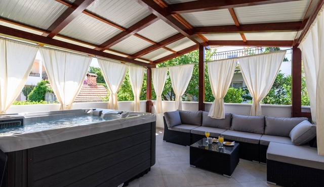 Two bedroom apartment with hot tub by the beach Arbanija, Čiovo (A-16762-a)