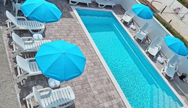 Two bedroom apartment with a swimming pool Murine, Umag (A-27509-a)