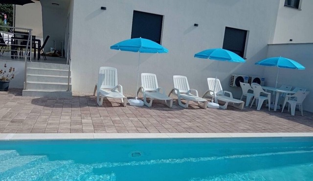 Two bedroom apartment with a swimming pool Murine, Umag (A-27509-b)
