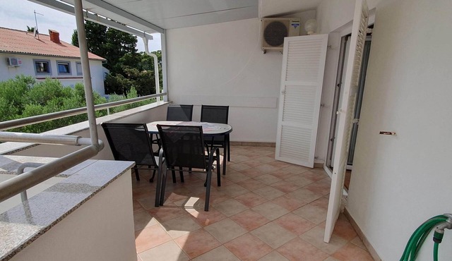 Two bedroom apartment with terrace and sea view Rab (A-14792-a) in Rab