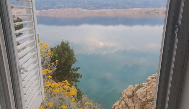 Unique place at the cliff, secluded mediterranean habitat, two beaches.