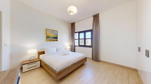 Vacationer Holiday Homes l Cozy 1 Bed l Jumeirah Golf Estate l Free Pool, Gym in Dubai