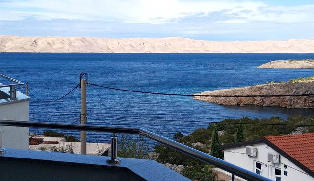 Villa Luce, apartment Maslina 70 m from the sea, with sea view at Karlobag.