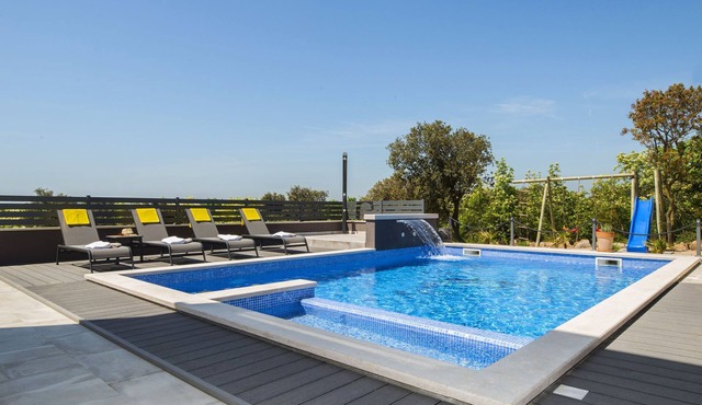 Villa with swimming pool, outdoor kitchen, sauna, jacuzzi, play area and sea view