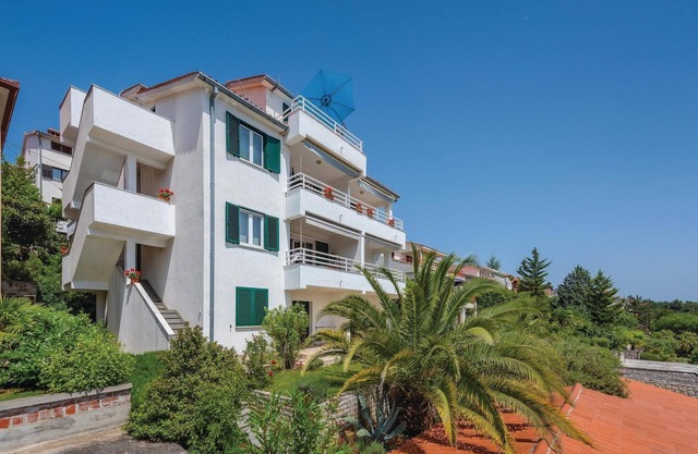 Beach front apartment in Rabac with WiFi