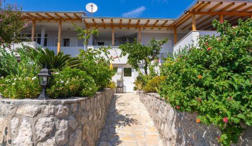Deluxe One-Bedroom Apartment with Balcony and Garden View