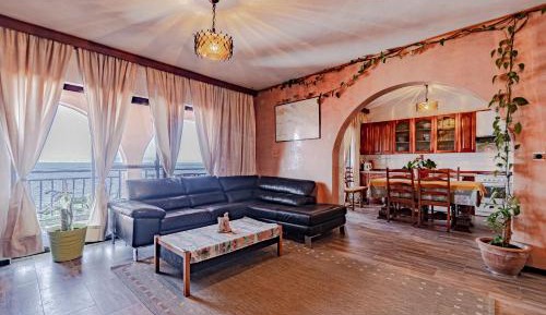Three-Bedroom Apartment with Terrace and Sea View