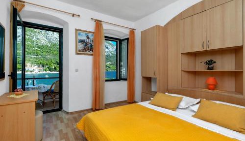 Three-Bedroom Apartment with Balcony and Sea View