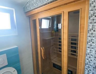 Three-Bedroom Apartment with Terrace and Sea View