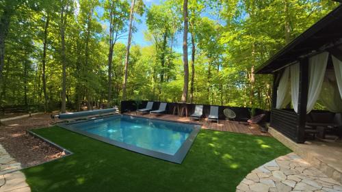 Ivanec Ski Chalet | Forest Escape with Jacuzzi & Pool Among the Trees by Destination GREEN Croatia