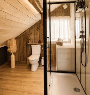 Kamno Apartment | Charming wooden loft in a restored 1920s house