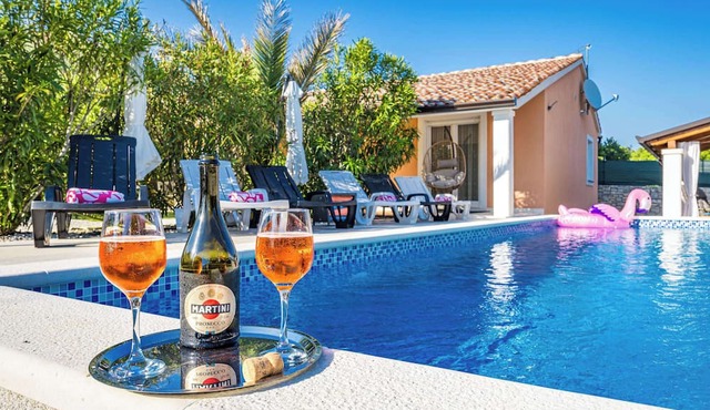 Holiday House Nives with pool and playground
